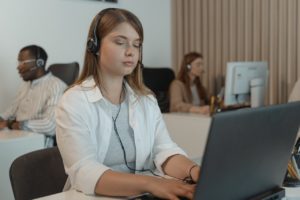 call center technology trends woman at computer